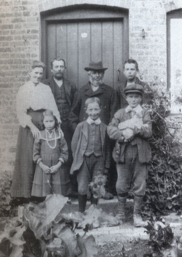 Thomas (centre, back), William (left, back) and Eddie (right, back)